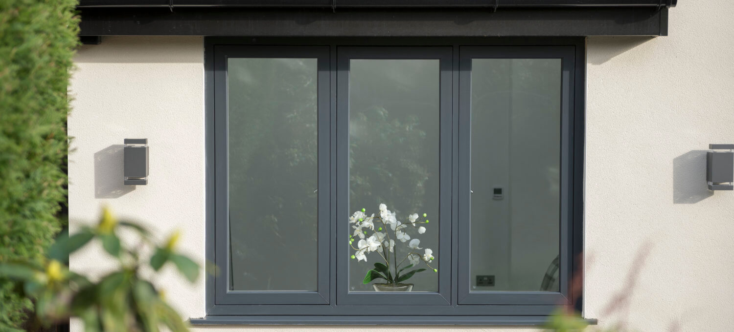 Dark grey flush sash windows