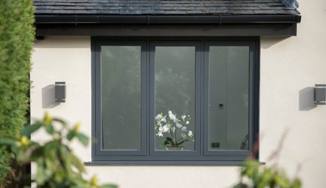 Dark grey flush sash windows