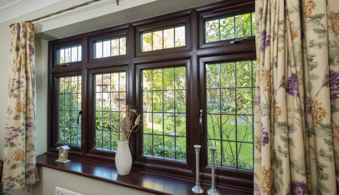 dark brown leaded sculptured sash windows