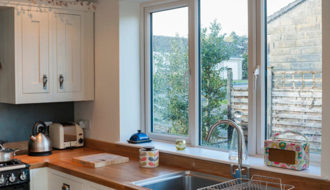 white 2800 sculptured uPVC windows in a kitchen suitable for an efficient sustainable home