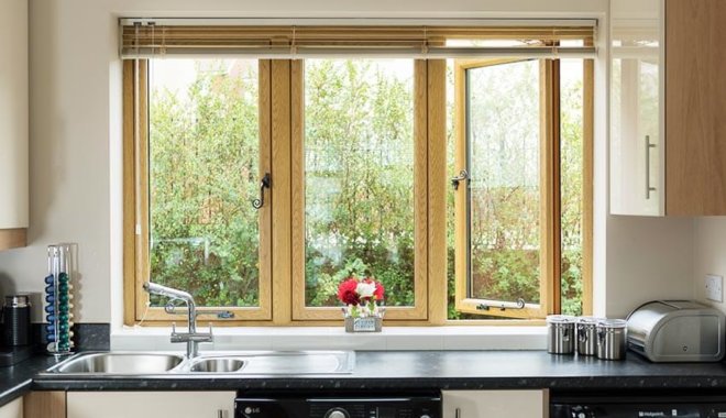 irish oak upvc flush sash windows above a kitchen sink