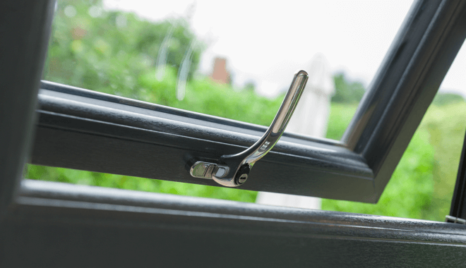 close up of handle hardware of sculptured sash windows