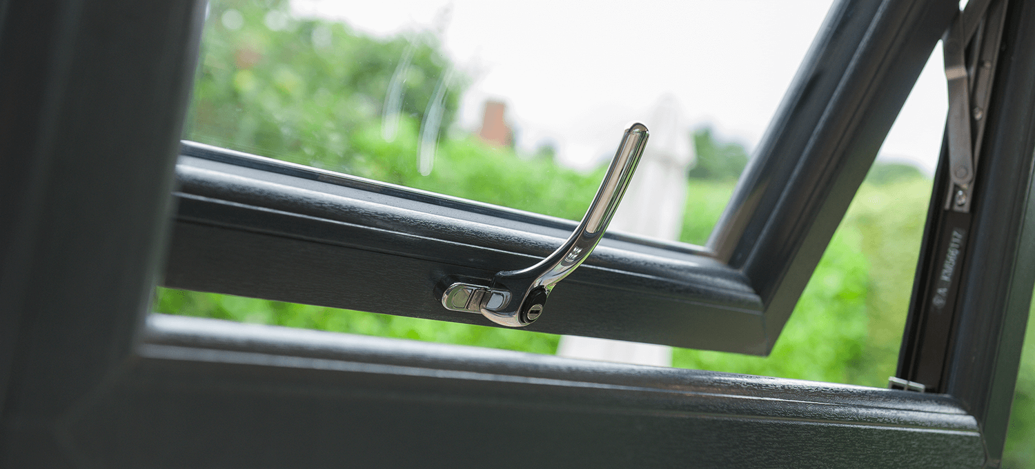 close up of handle hardware of sculptured sash windows